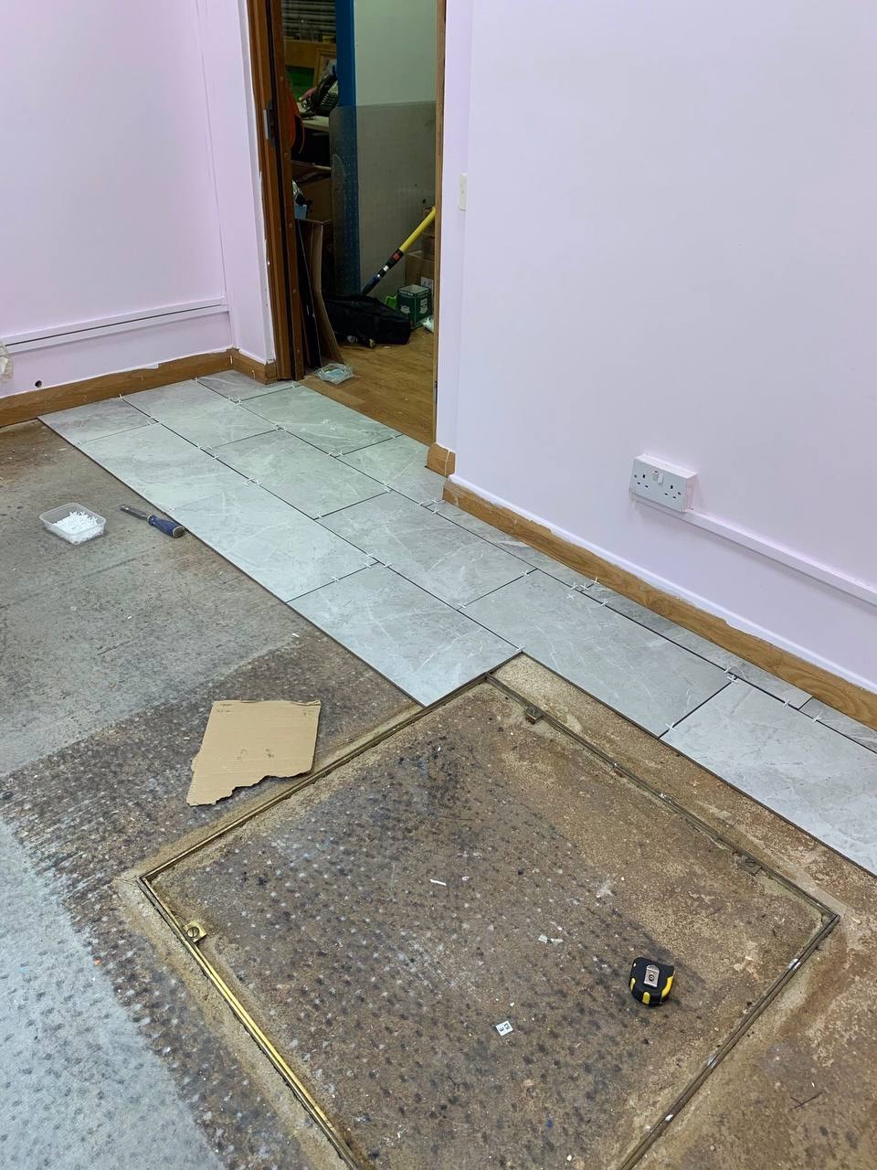 Floor tiling in progress — West London